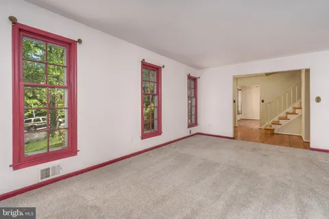 a view of an empty room with window