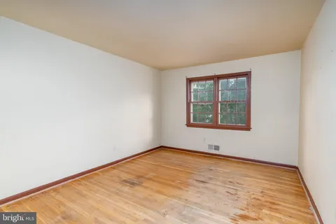 a view of an empty room with window