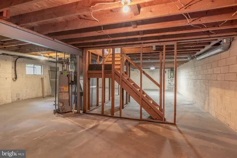 a view of an empty room with stairs