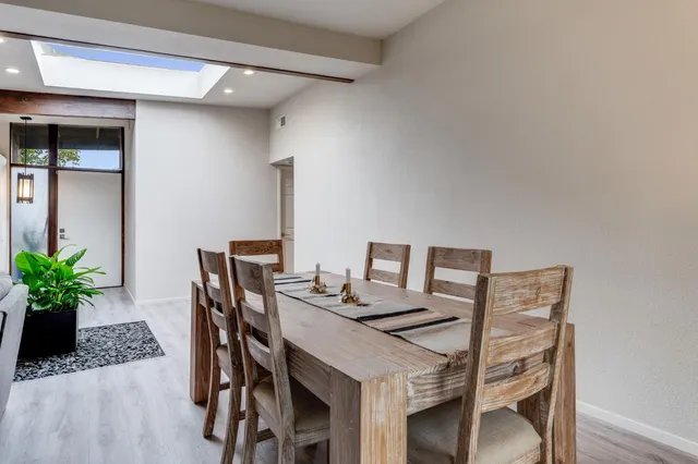 a lobby with furniture and wooden floor