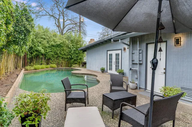 a backyard of a house with lots of green space