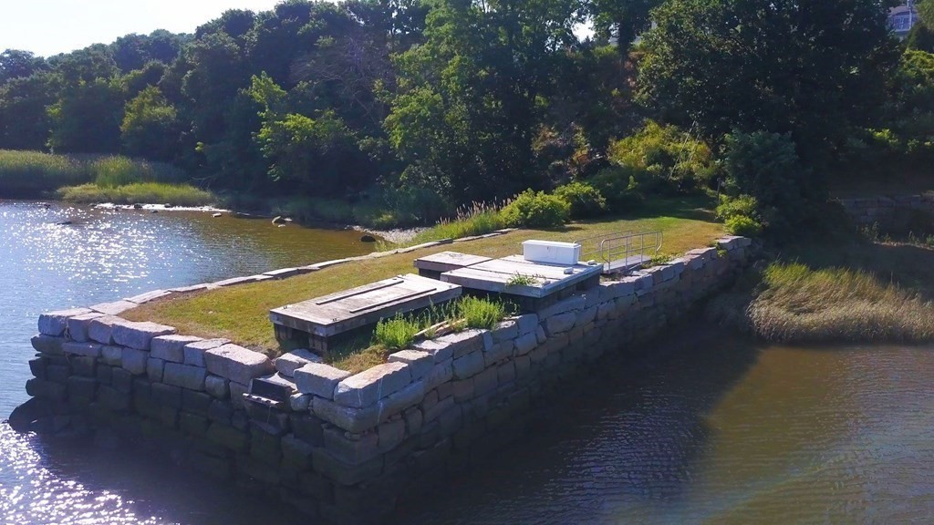 106 Forbes Road Milton, MA 02186 - Photo 21 of 27 a view of a backyard with swimming pool