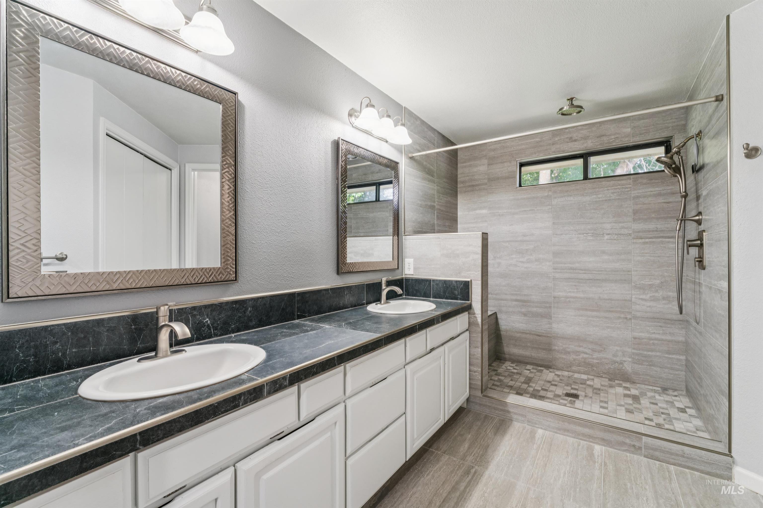 9831 West Ripley Street Boise, ID 83704 - Photo 20 of 47 Spacious room featuring neutral carpeting, light-toned walls, and a window with blinds