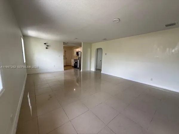 a view of a hallway with entryway