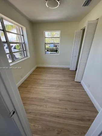 a bathroom with a sink toilet and vanity