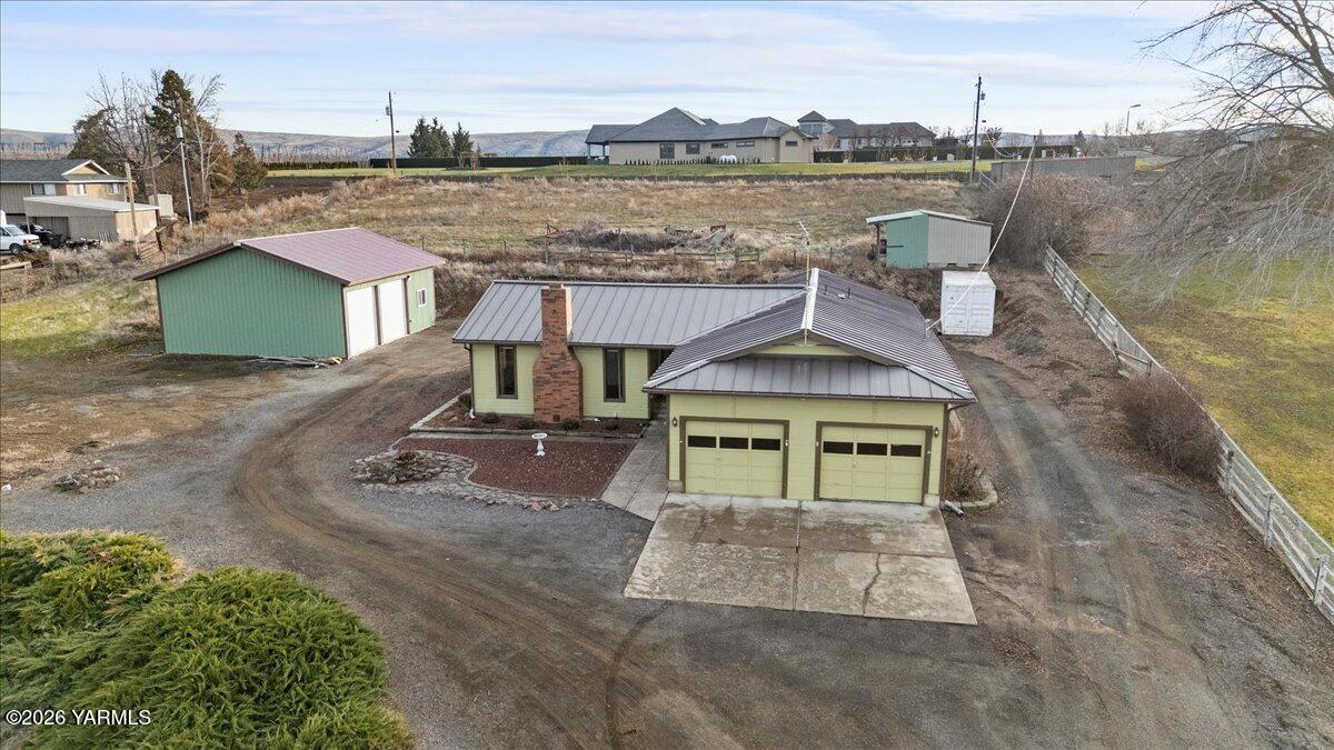 10802 Zier Road Yakima, WA 98908 - Photo 1 of 46 an aerial view of a house with lake view