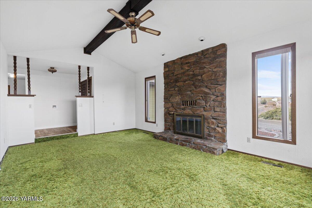 10802 Zier Road Yakima, WA 98908 - Photo 27 of 46 a view of a livingroom with a fireplace and window
