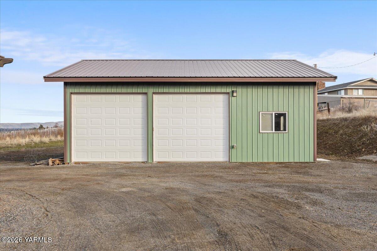 10802 Zier Road Yakima, WA 98908 - Photo 9 of 46 a view of a house with a backyard