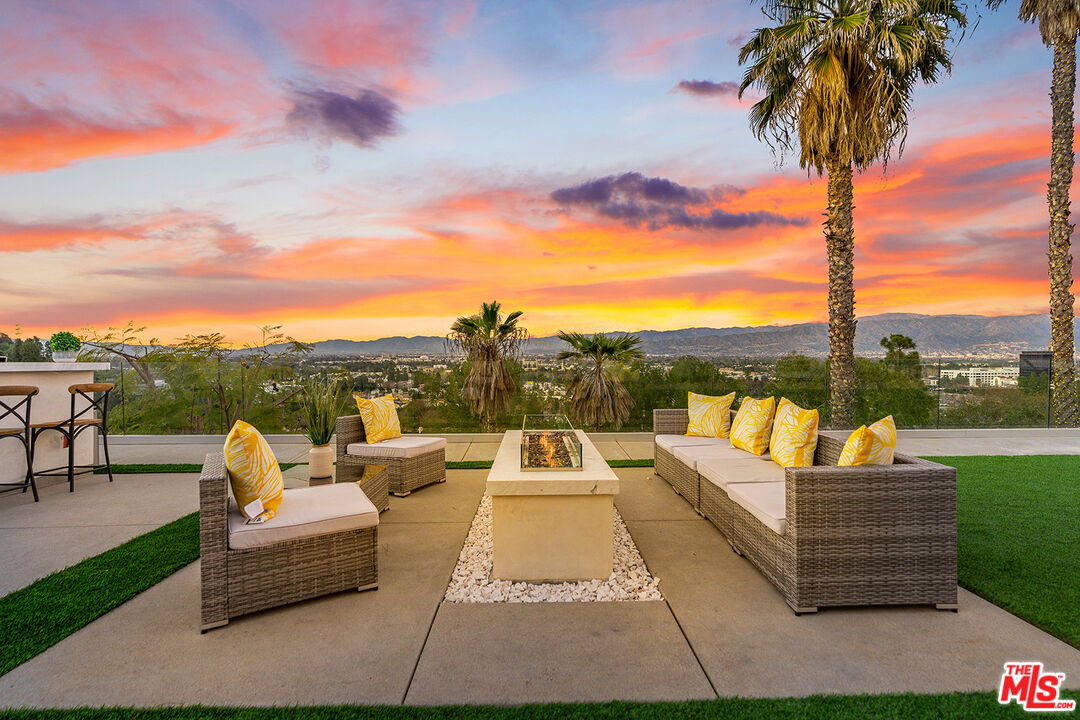 10901 Terryview Drive Studio City, CA 91604 - Photo 1 of 50 a view of a terrace with couches and lounge chairs