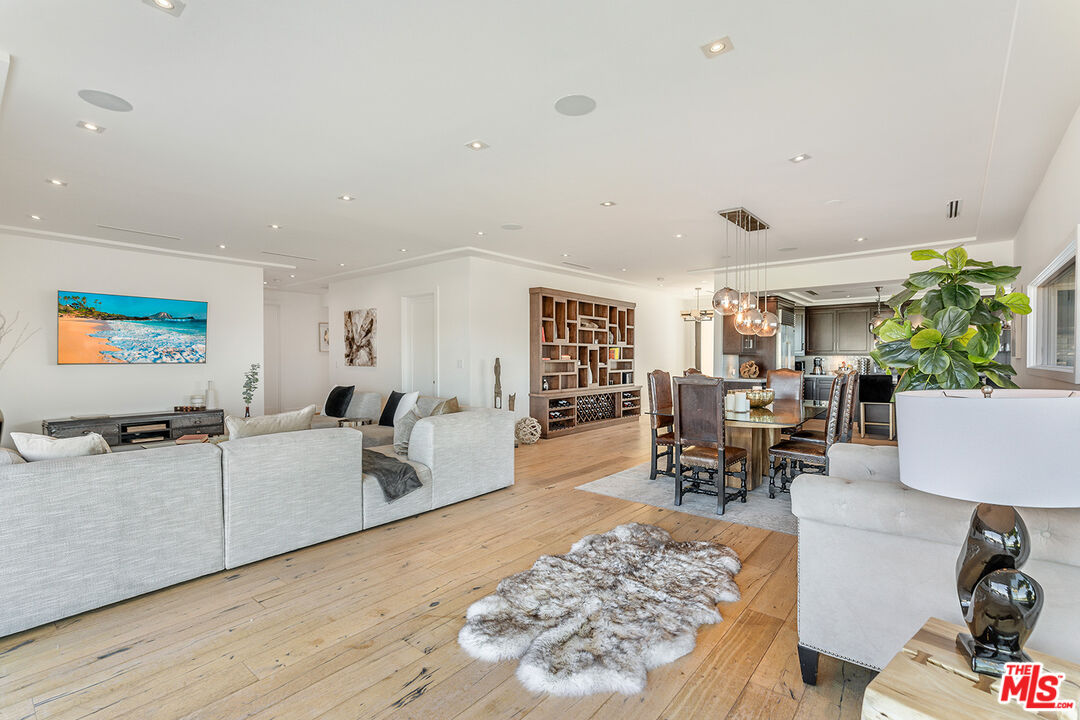 10901 Terryview Drive Studio City, CA 91604 - Photo 12 of 50 a living room with furniture and a flat screen tv
