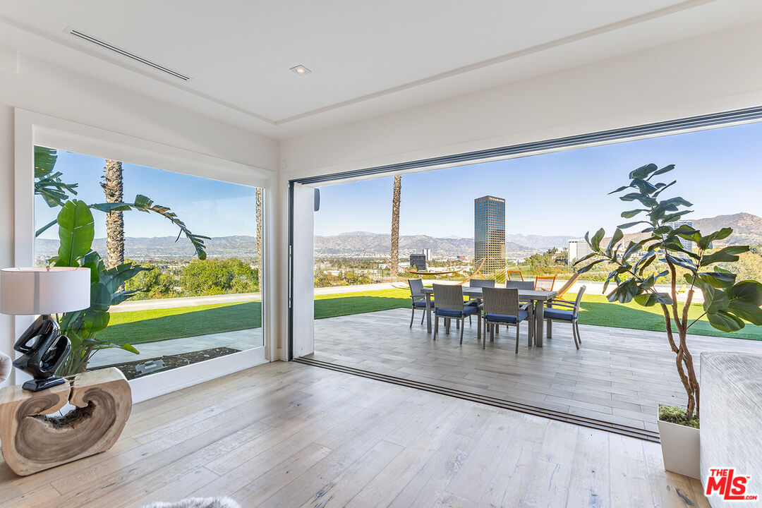 10901 Terryview Drive Studio City, CA 91604 - Photo 18 of 50 a view of a dining room with furniture window and outside view