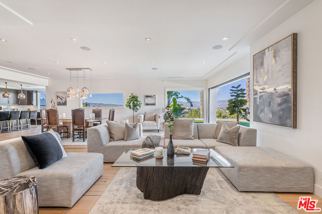 10901 Terryview Drive Studio City, CA 91604 - Photo 21 of 50 a living room with furniture and a large window