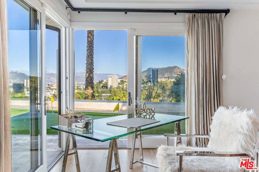10901 Terryview Drive Studio City, CA 91604 - Photo 27 of 50 a view of a dining room with furniture window and outside view