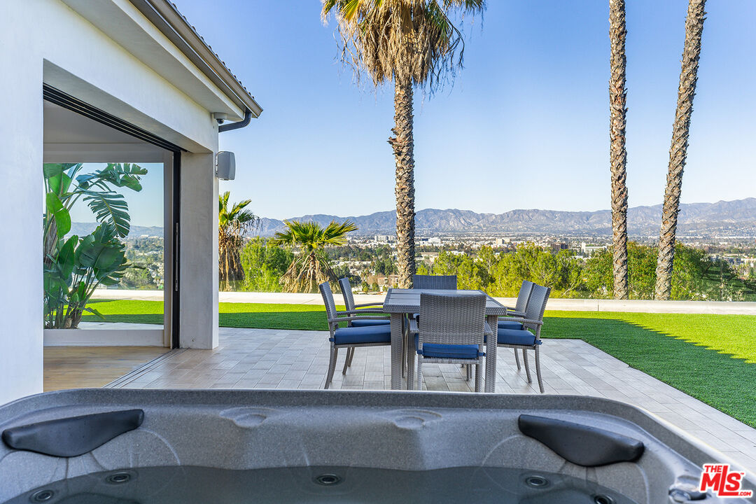 10901 Terryview Drive Studio City, CA 91604 - Photo 45 of 50 a view of a patio with chairs and a table