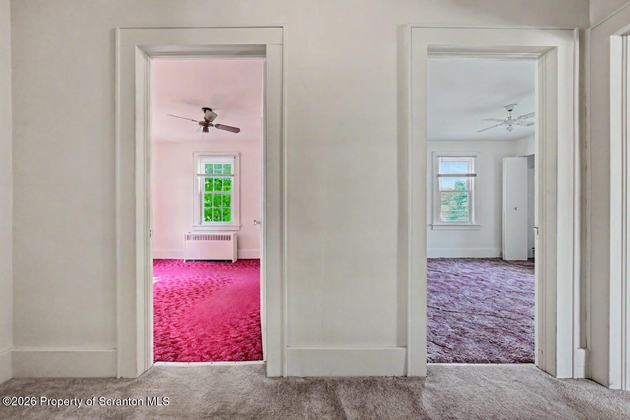 502 Layton Road Clarks Summit, PA 18411 - Photo 22 of 42 a view of a hallway view with wooden floor and a bathroom