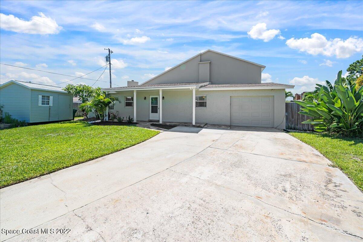 1730 Via Roma Merritt Island, FL 32952 - Photo 30 of 33 Second Entrance/Driveway