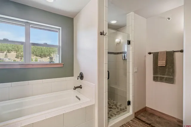 a view of a hallway with washer and dryer
