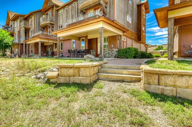 a view of a swimming pool with a lake view