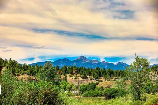 a view of a lake from a balcony