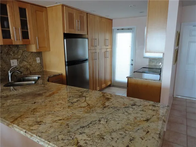 a view of balcony with furniture