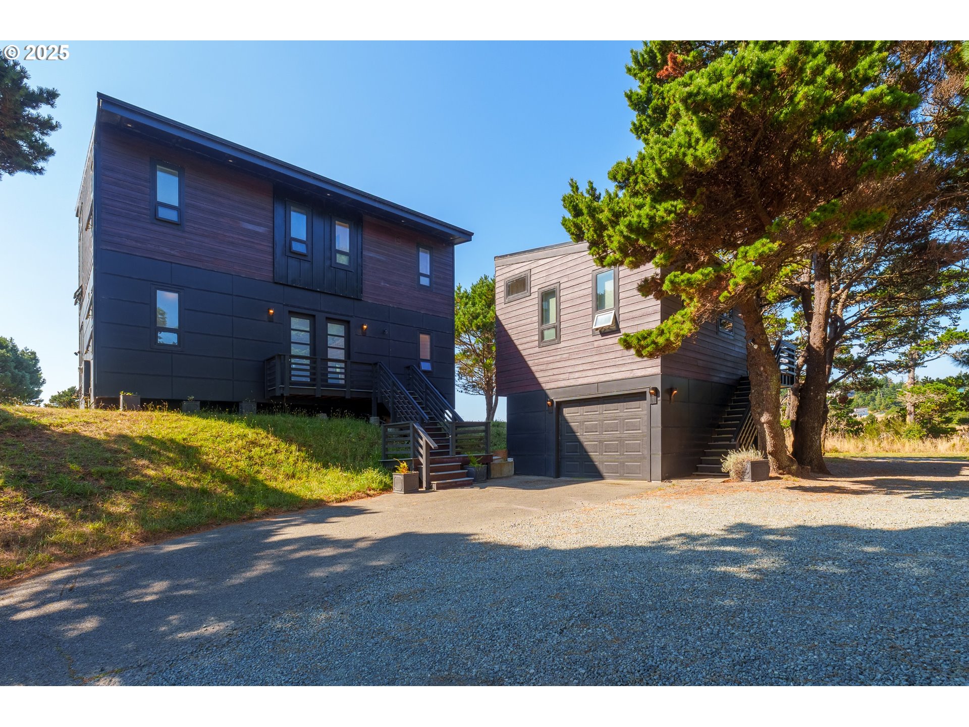 409 Jackson Street Port Orford, OR 97465 - Photo 13 of 48 a view of an house with a yard