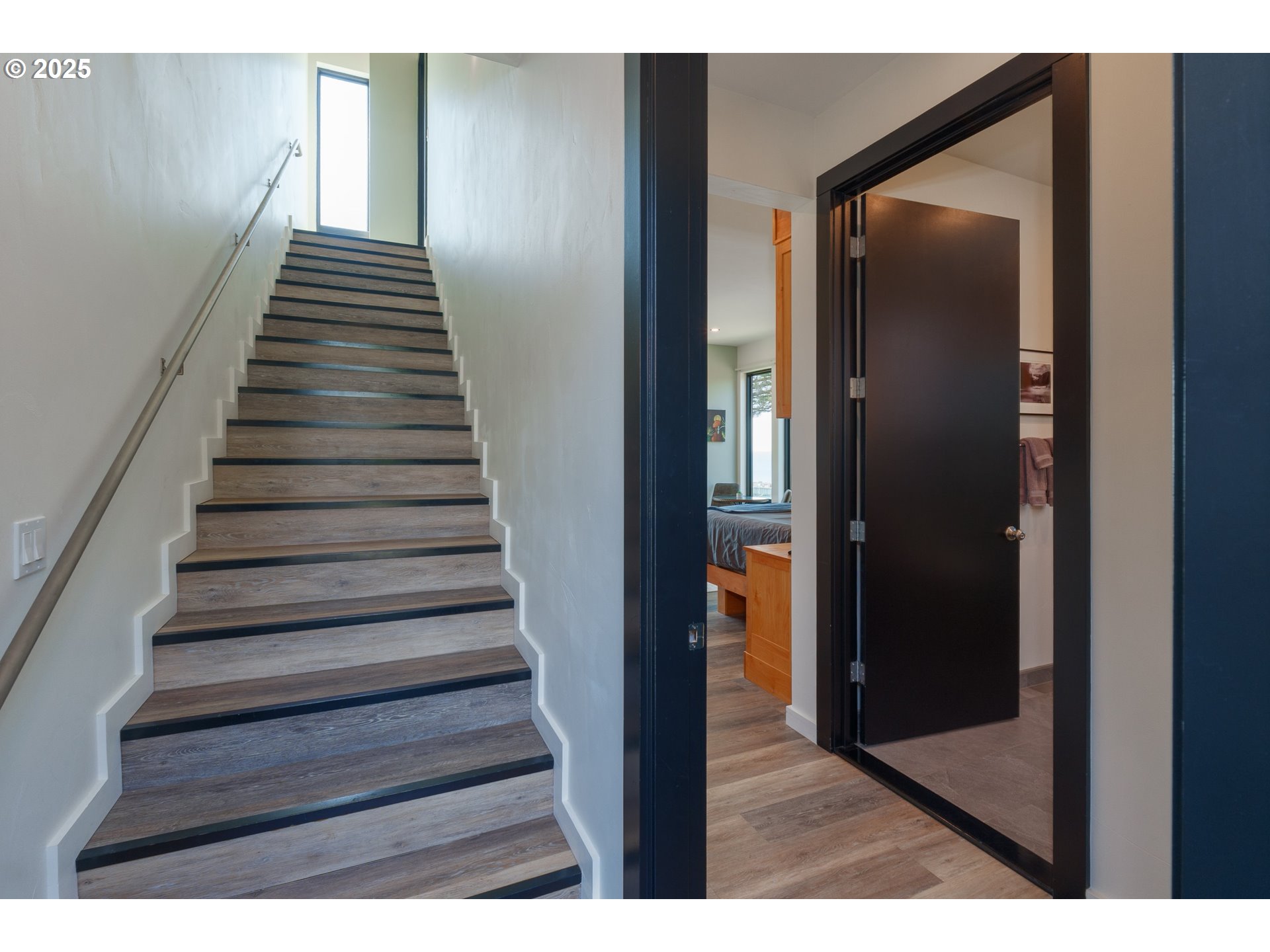 409 Jackson Street Port Orford, OR 97465 - Photo 15 of 48 a view of entryway and hall with wooden floor