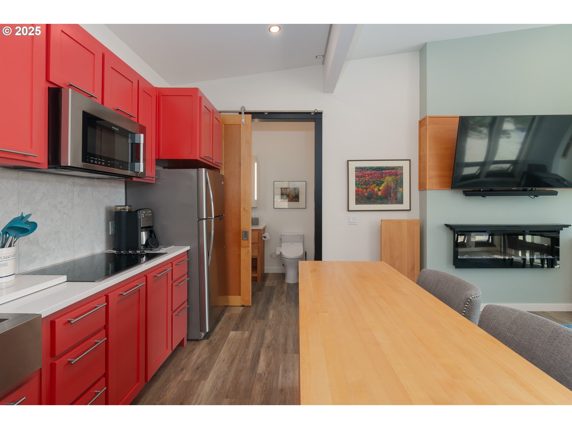 409 Jackson Street Port Orford, OR 97465 - Photo 20 of 48 a kitchen with stainless steel appliances granite countertop a refrigerator stove top oven a sink and dishwasher