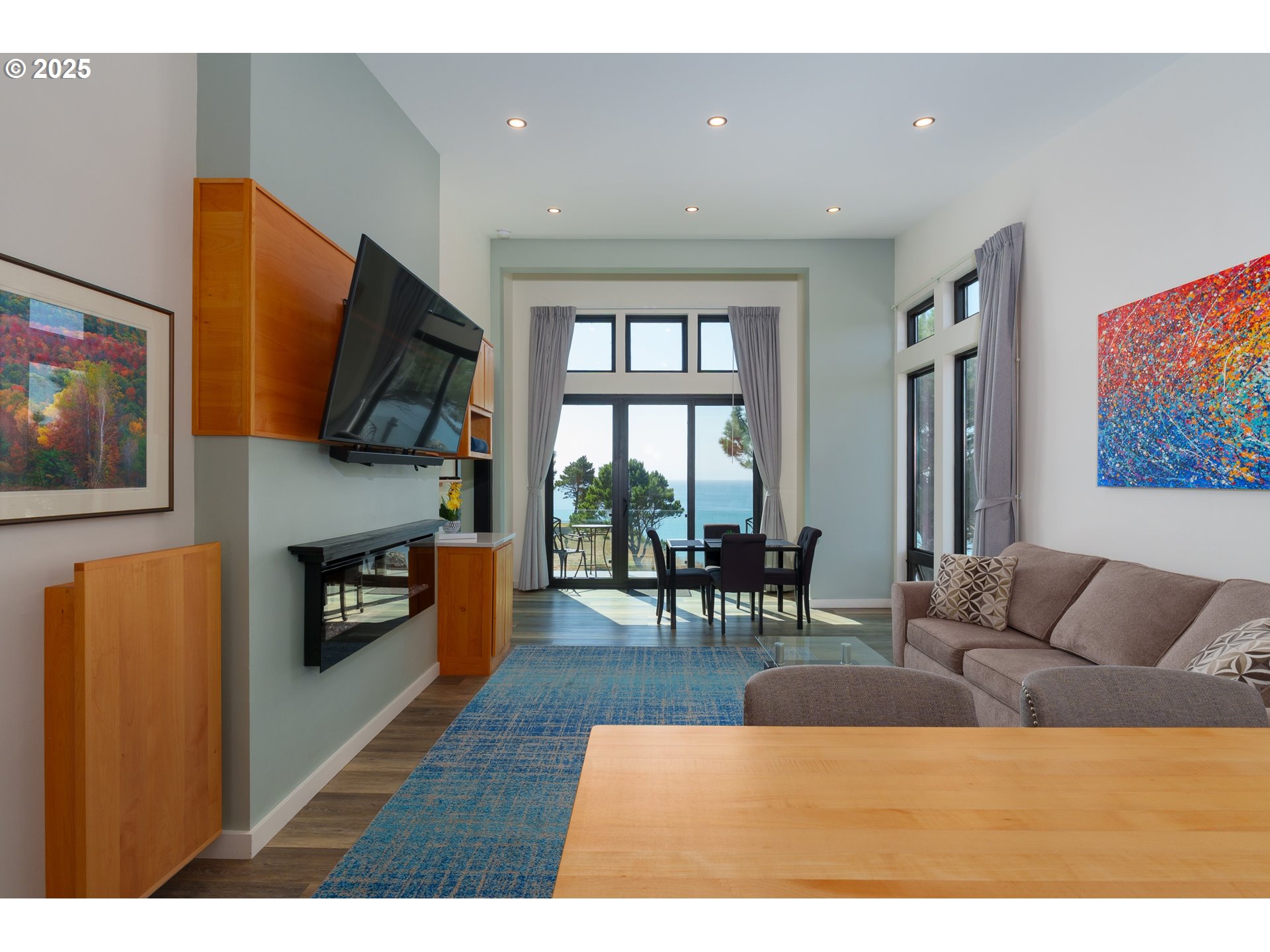 409 Jackson Street Port Orford, OR 97465 - Photo 21 of 48 a living room with furniture and a flat screen tv