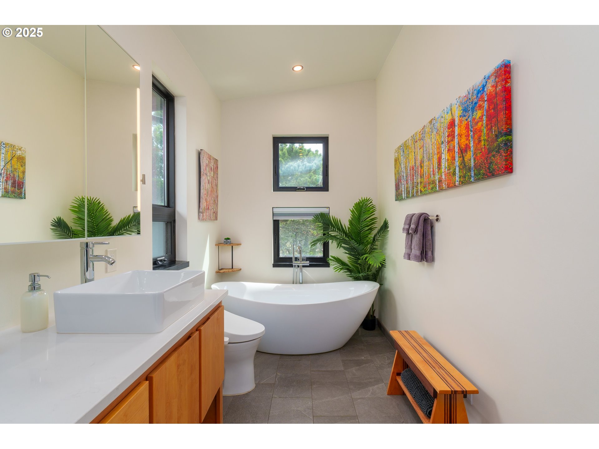 409 Jackson Street Port Orford, OR 97465 - Photo 36 of 48 a bathroom with a bathtub sink and mirror
