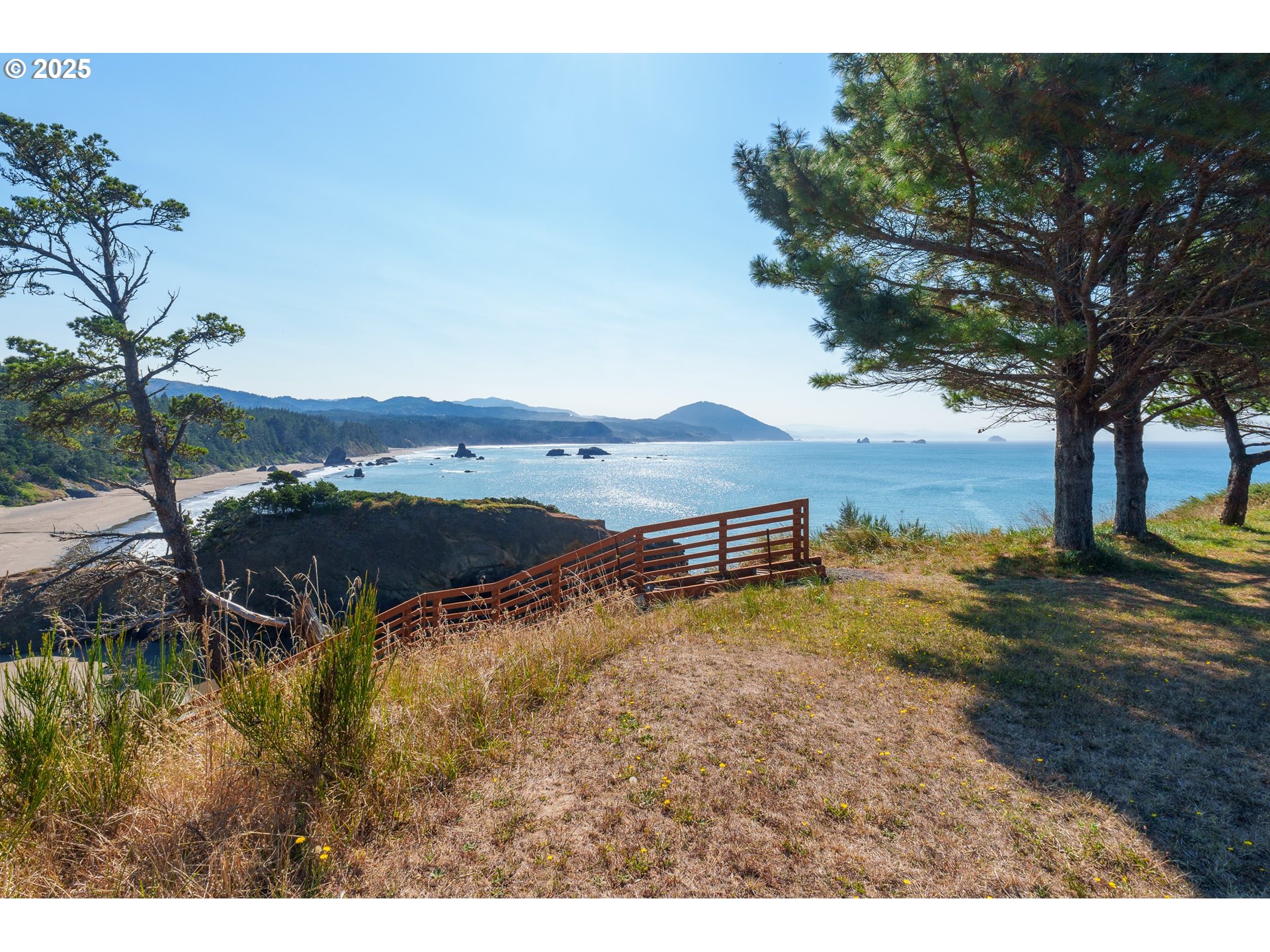 409 Jackson Street Port Orford, OR 97465 - Photo 5 of 48 a view of a yard with an outdoor space