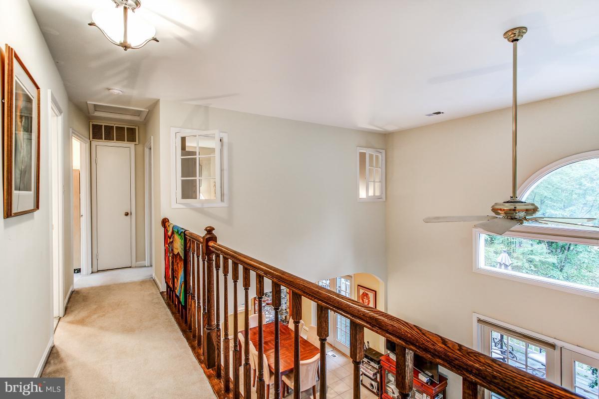 2225 Wakerobin Lane Reston, VA 20191 - Photo 22 of 30 a view of a hallway with windows