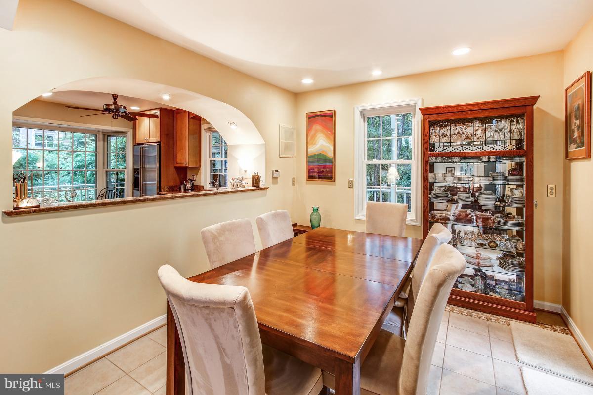 2225 Wakerobin Lane Reston, VA 20191 - Photo 8 of 30 a view of a dining room with furniture window and outside view