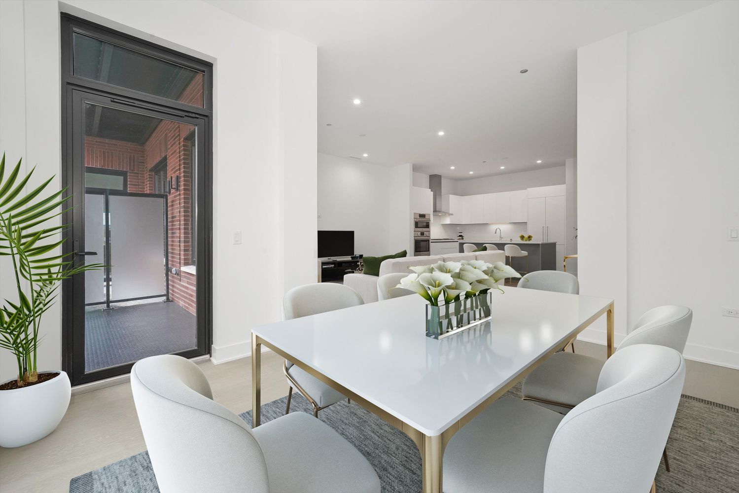 323 South Racine Avenue, Unit 3C Chicago, IL 60607 - Photo 7 of 18 a dining room with furniture and wooden floor