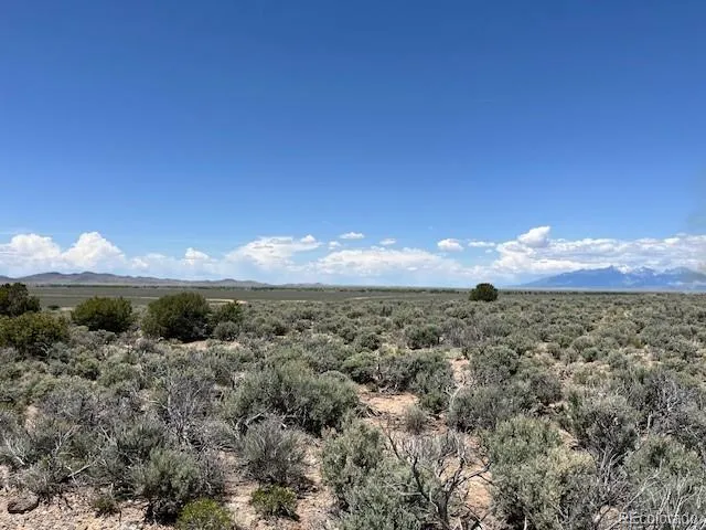 a view of a lake with a mountain