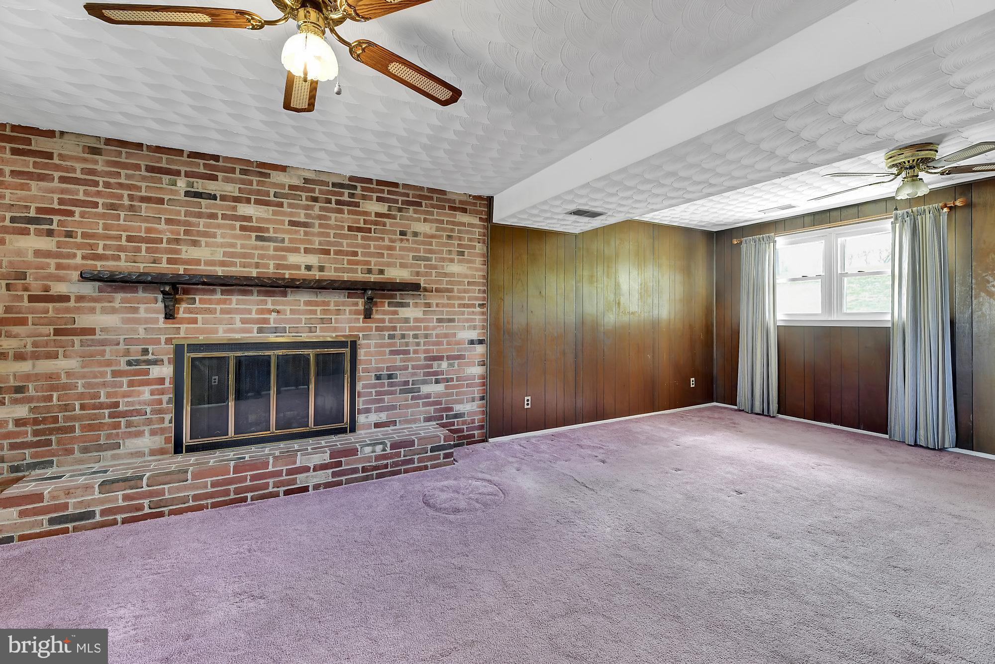9107 Santa Rita Road Baltimore, MD 21236 - Photo 16 of 21 Cozy wood burning fireplace