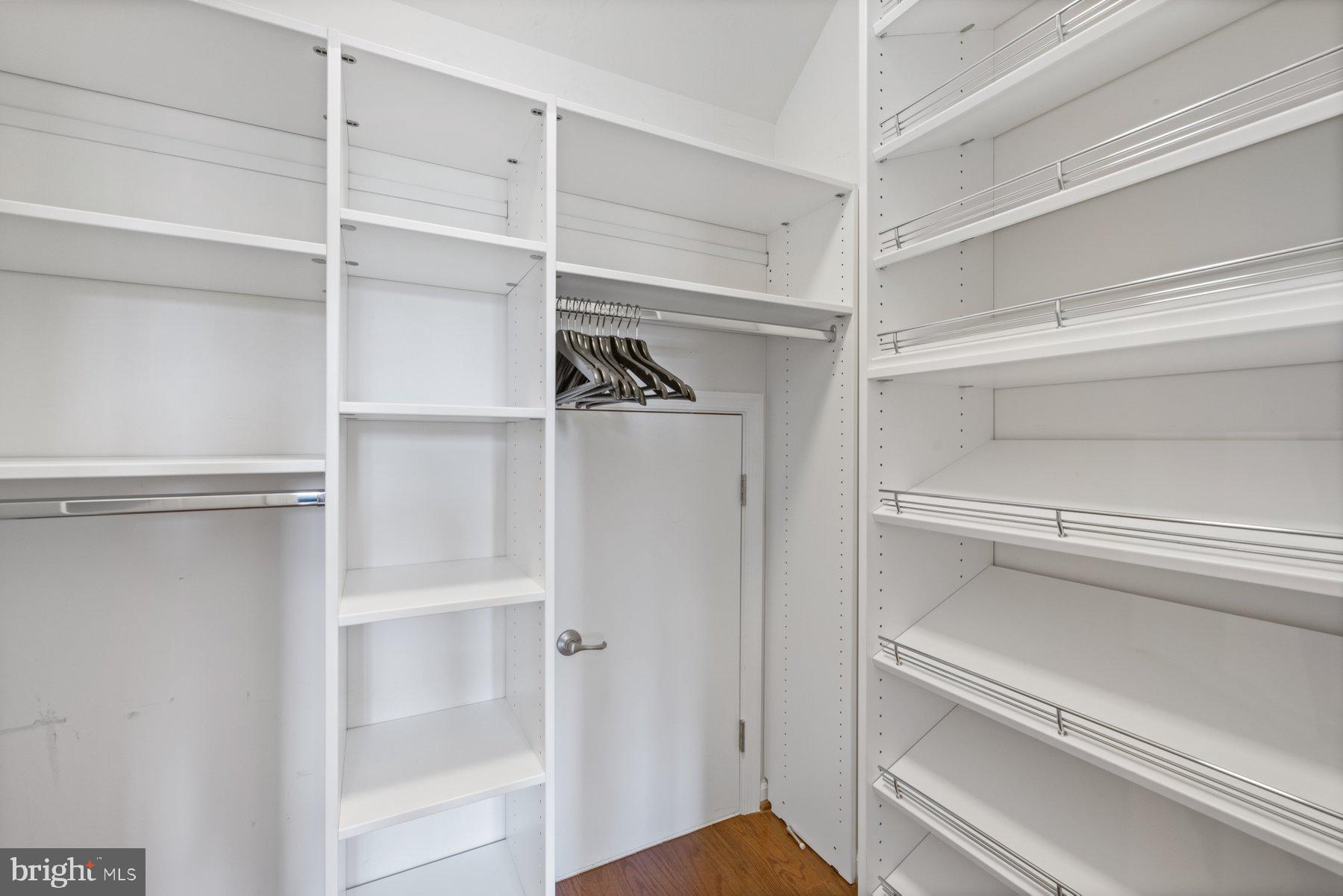 2514 Ralph Ellison Way Northeast Washington, DC 20018 - Photo 30 of 31 a view of walk in closet with empty racks