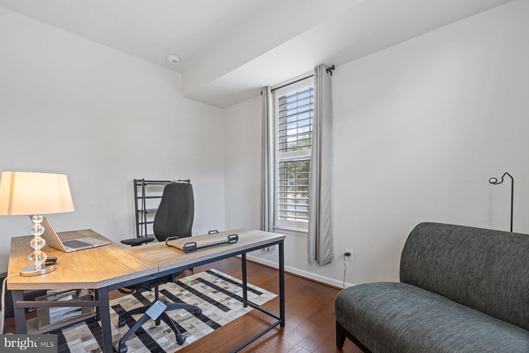 2514 Ralph Ellison Way Northeast Washington, DC 20018 - Photo 5 of 31 a room with furniture and a window
