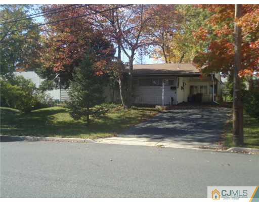 56 Princeton Road Old Bridge, NJ 08859 - Photo 1 of 8 a view of a house with a yard