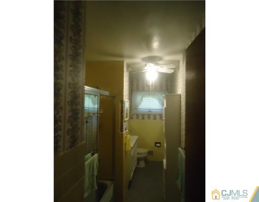 56 Princeton Road Old Bridge, NJ 08859 - Photo 8 of 8 a bathroom with a mirror