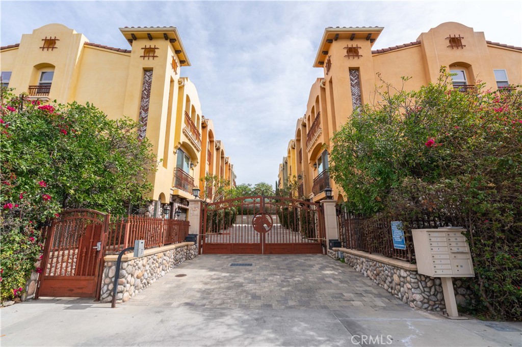 10148 Fernglen Avenue, Unit 2 Tujunga, CA 91042 - Photo 1 of 1 a front view of a house with a yard