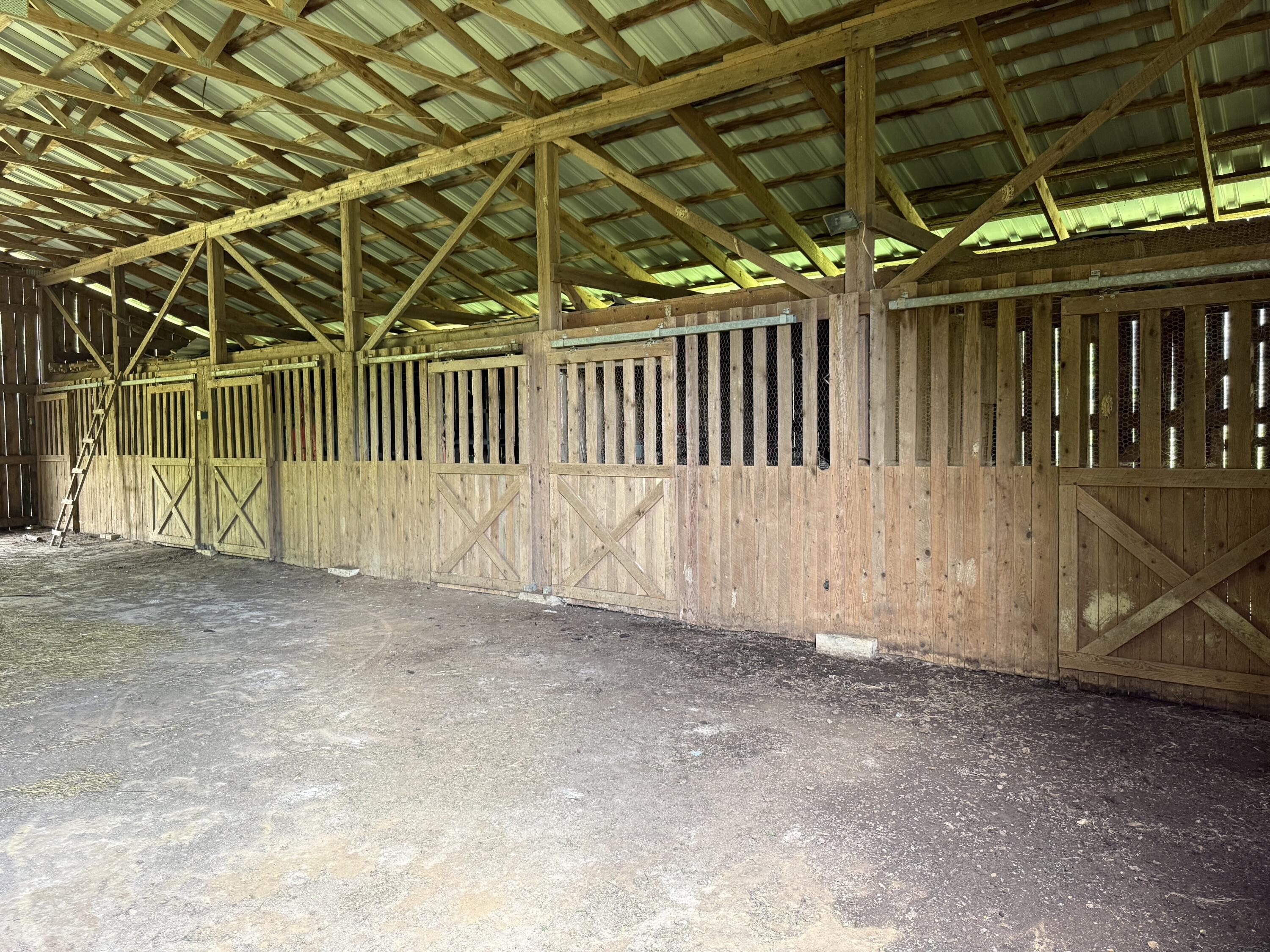 342 Dewey Banks Road Campton, KY 41301 - Photo 60 of 64 060 stalls all along the right side, thi
