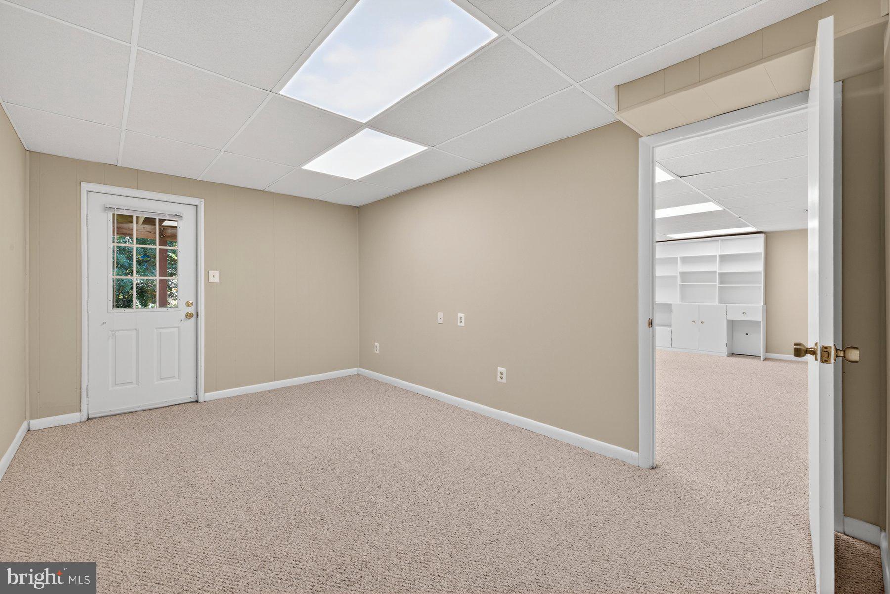 8537 Hooes Road Springfield, VA 22153 - Photo 22 of 30 an empty room with windows and closet