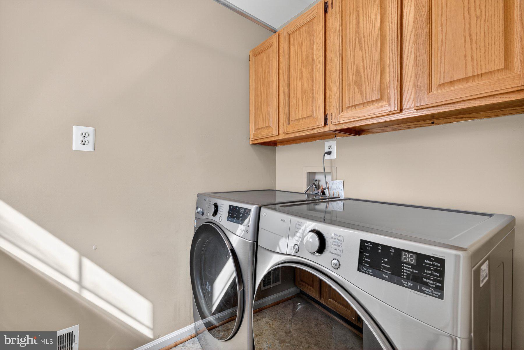 8537 Hooes Road Springfield, VA 22153 - Photo 24 of 30 a utility room with dryer and washer