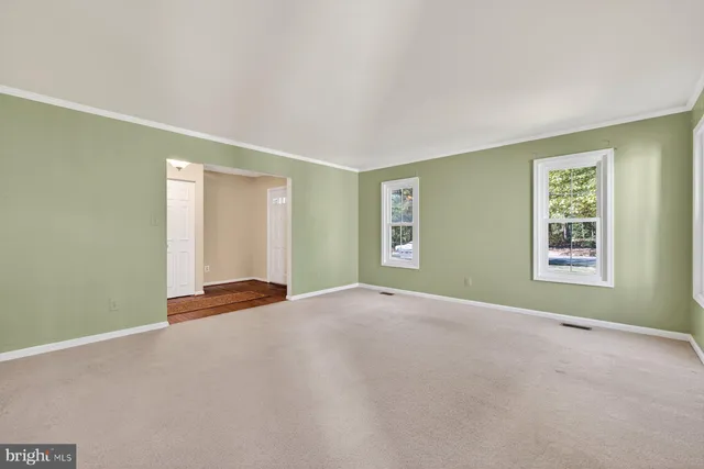 an empty room with windows