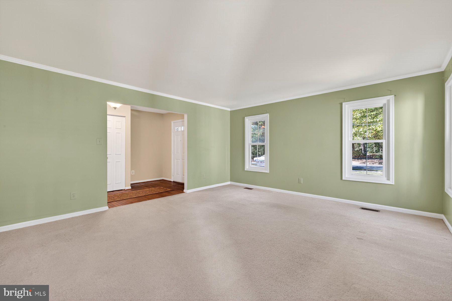 8537 Hooes Road Springfield, VA 22153 - Photo 4 of 30 an empty room with windows