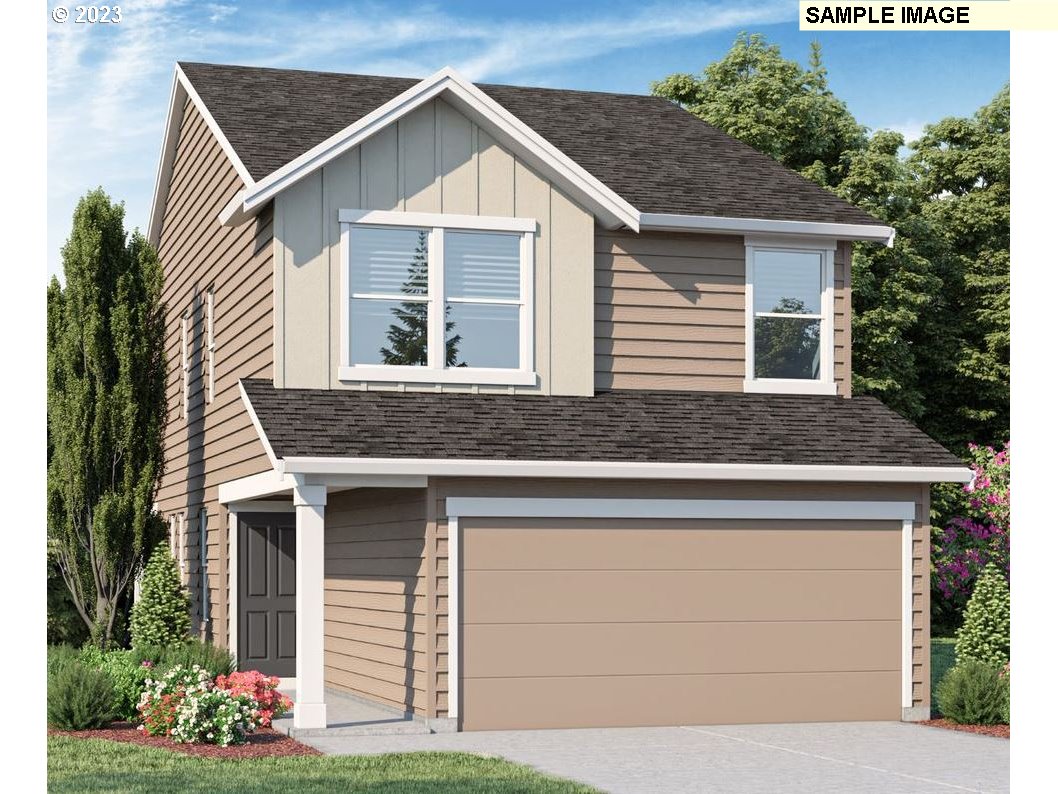 2918 North 3rd Way Ridgefield, WA 98642 - Photo 1 of 27 a front view of a house with garden