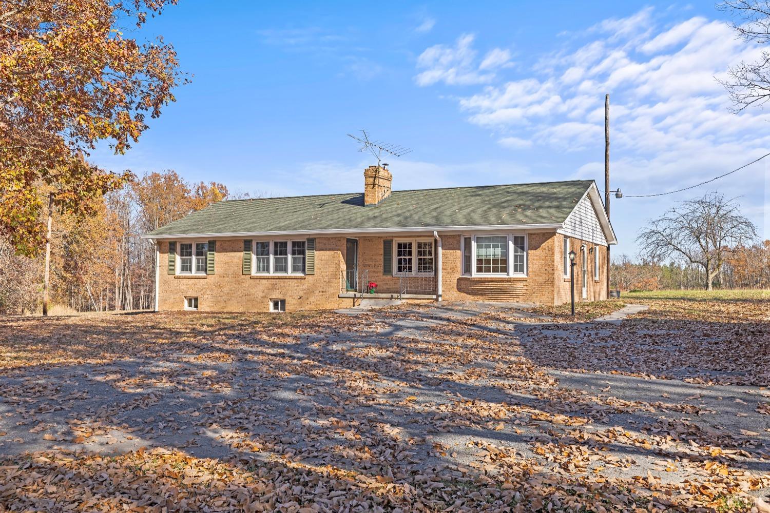 10572 Red House Road Red House, VA 23963 - Photo 1 of 21 a front view of a house with a yard