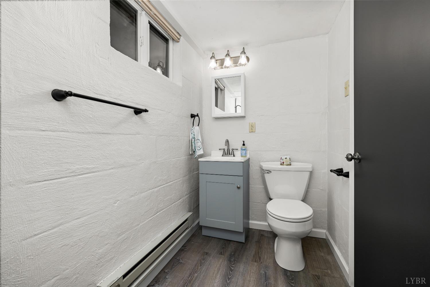 10572 Red House Road Red House, VA 23963 - Photo 21 of 21 a bathroom with a toilet and a sink