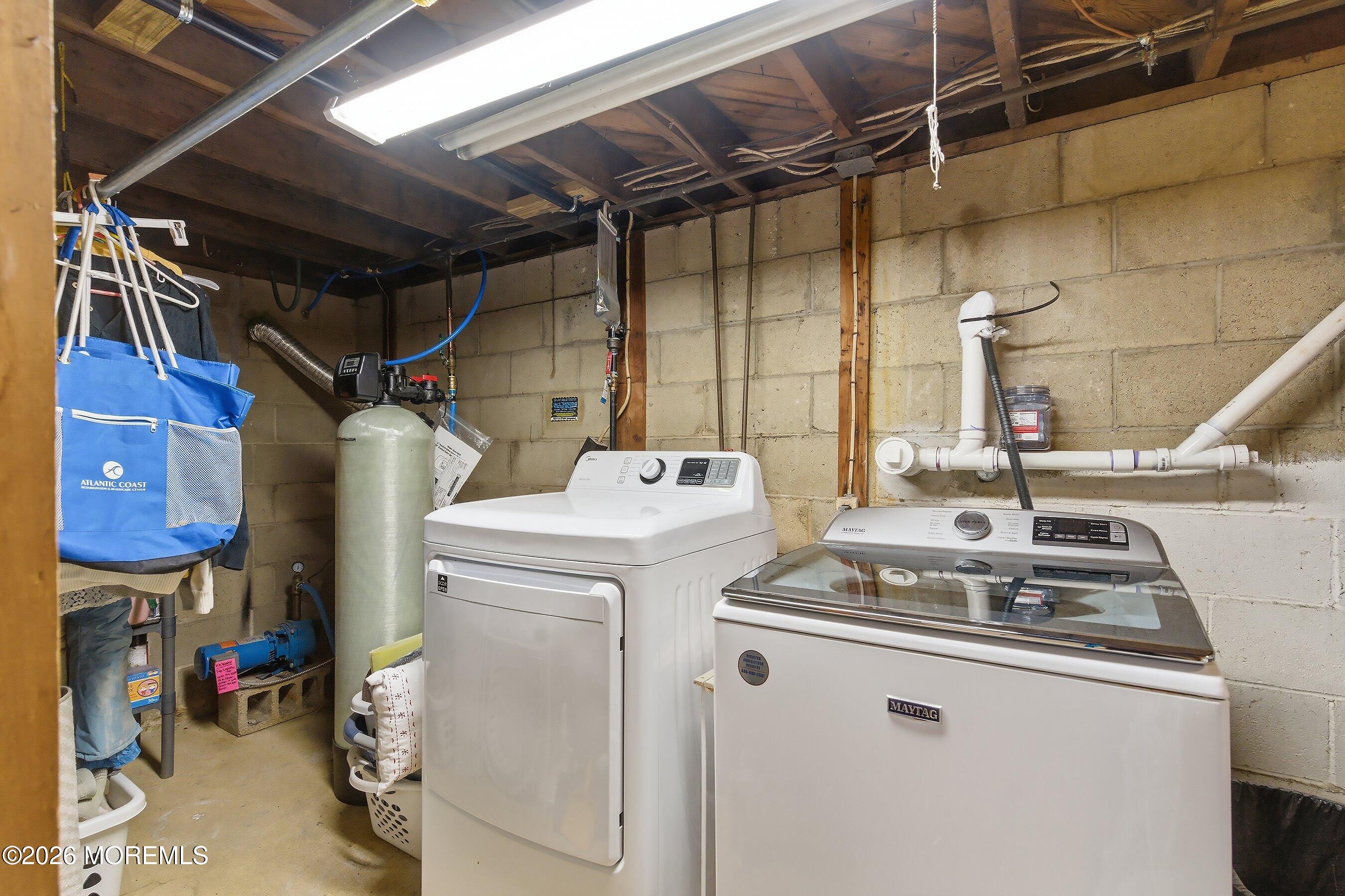 745 Oak Glen Road Howell, NJ 07731 - Photo 28 of 46 a utility room with dryer and washer