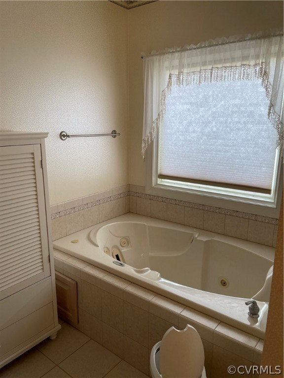 5413 Gatebridge Road Richmond, VA 23234 - Photo 11 of 16 a bathroom with a tub and a sink